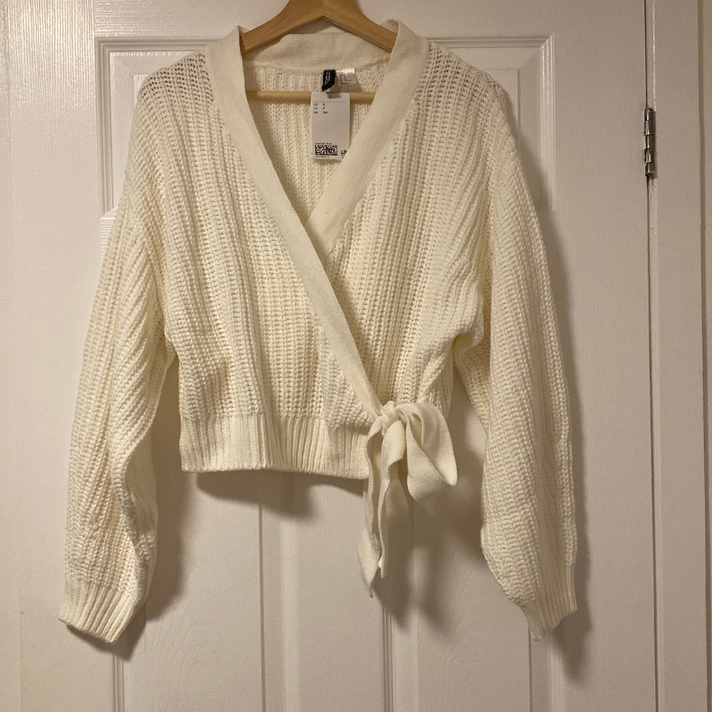 H&M wrap front cream sweater. Never worn. New with tags